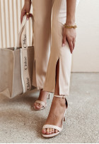 Materiałowe spodnie z rozcięciami She's Boss beżowe