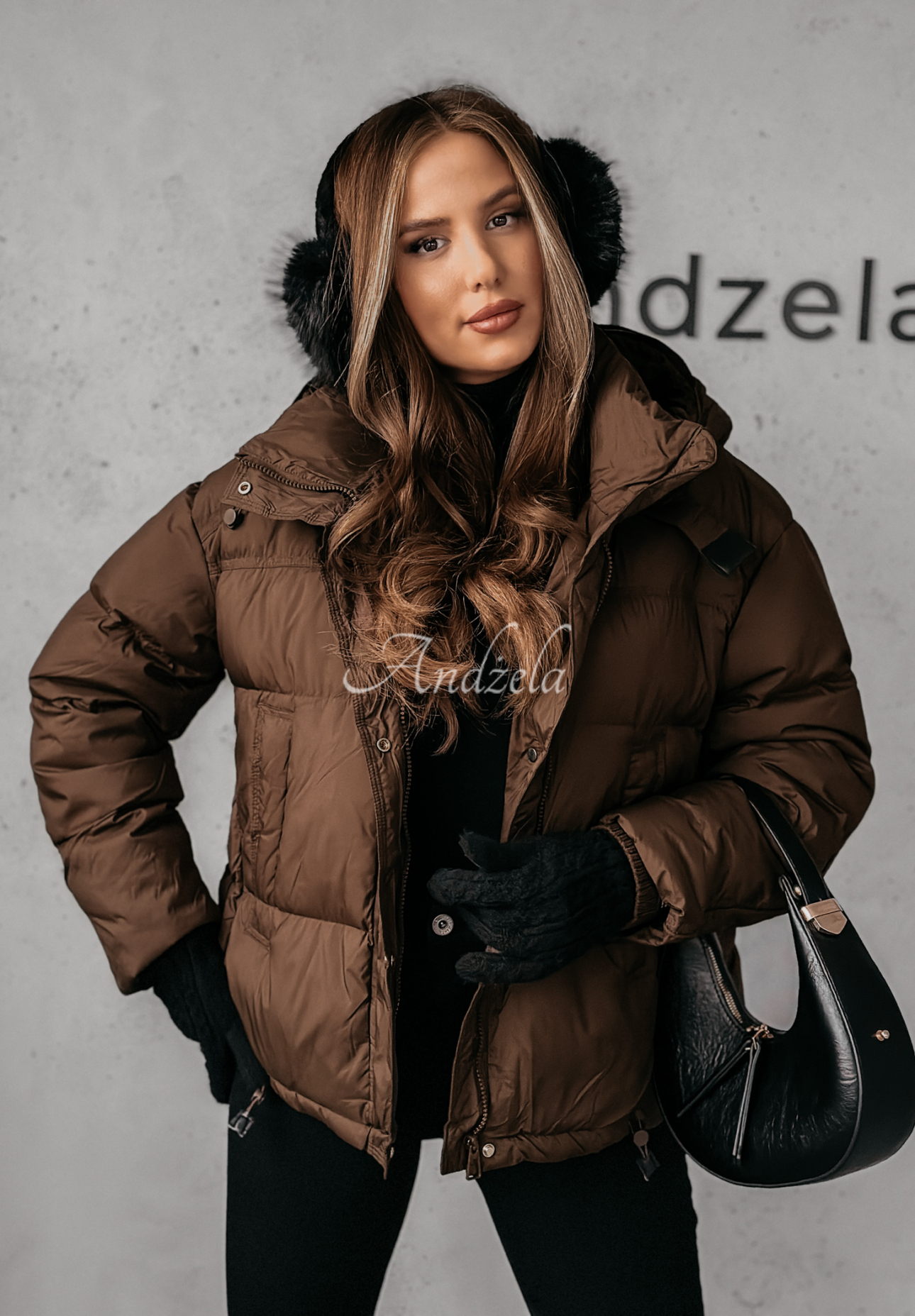 Aurora Skies chocolate down jacket with hood.