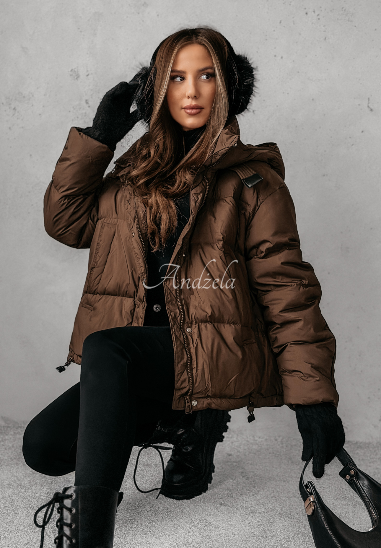 Aurora Skies chocolate down jacket with hood.