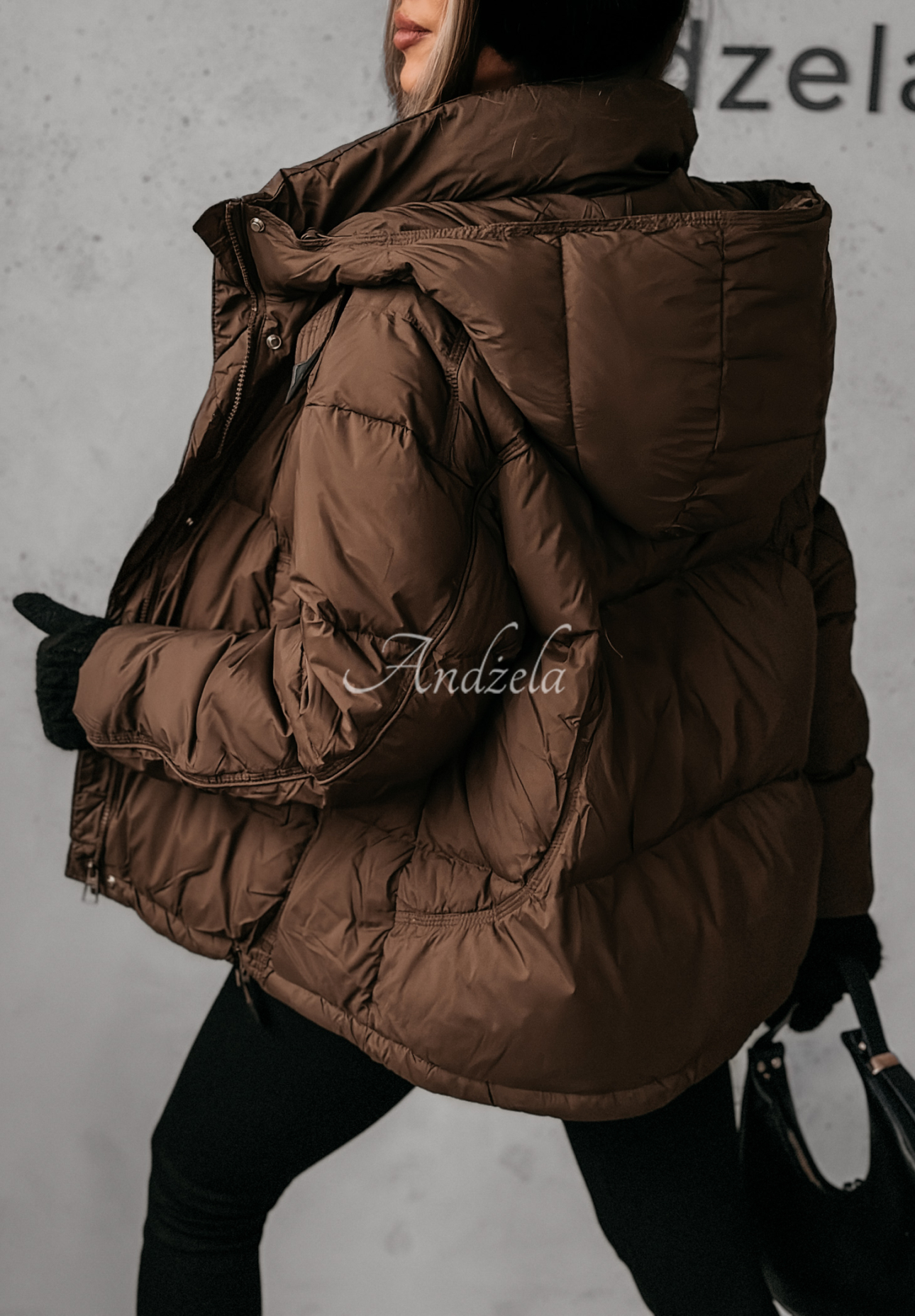 Aurora Skies chocolate down jacket with hood.