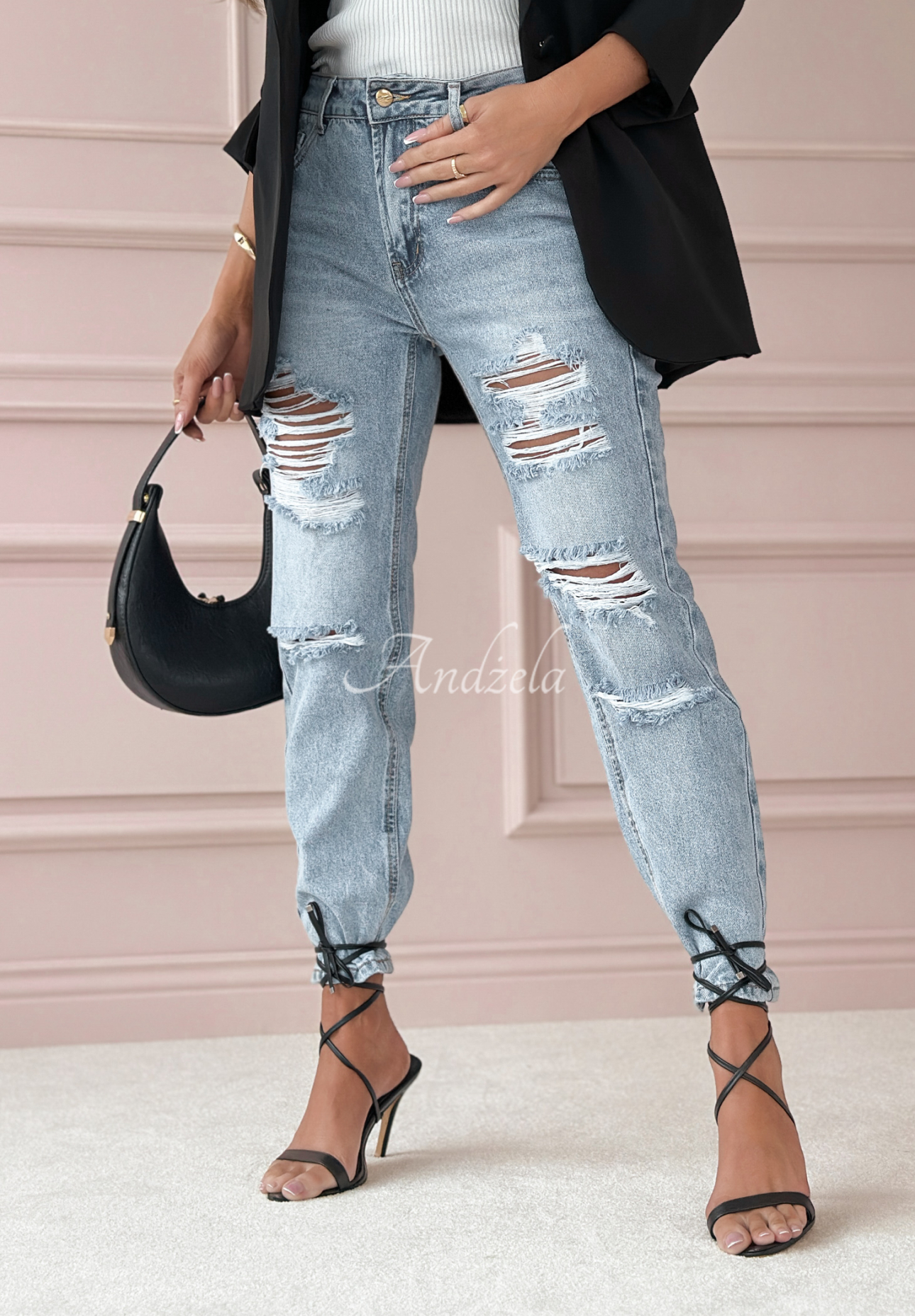 Greatest Joy light blue denim pants with rubbed edges