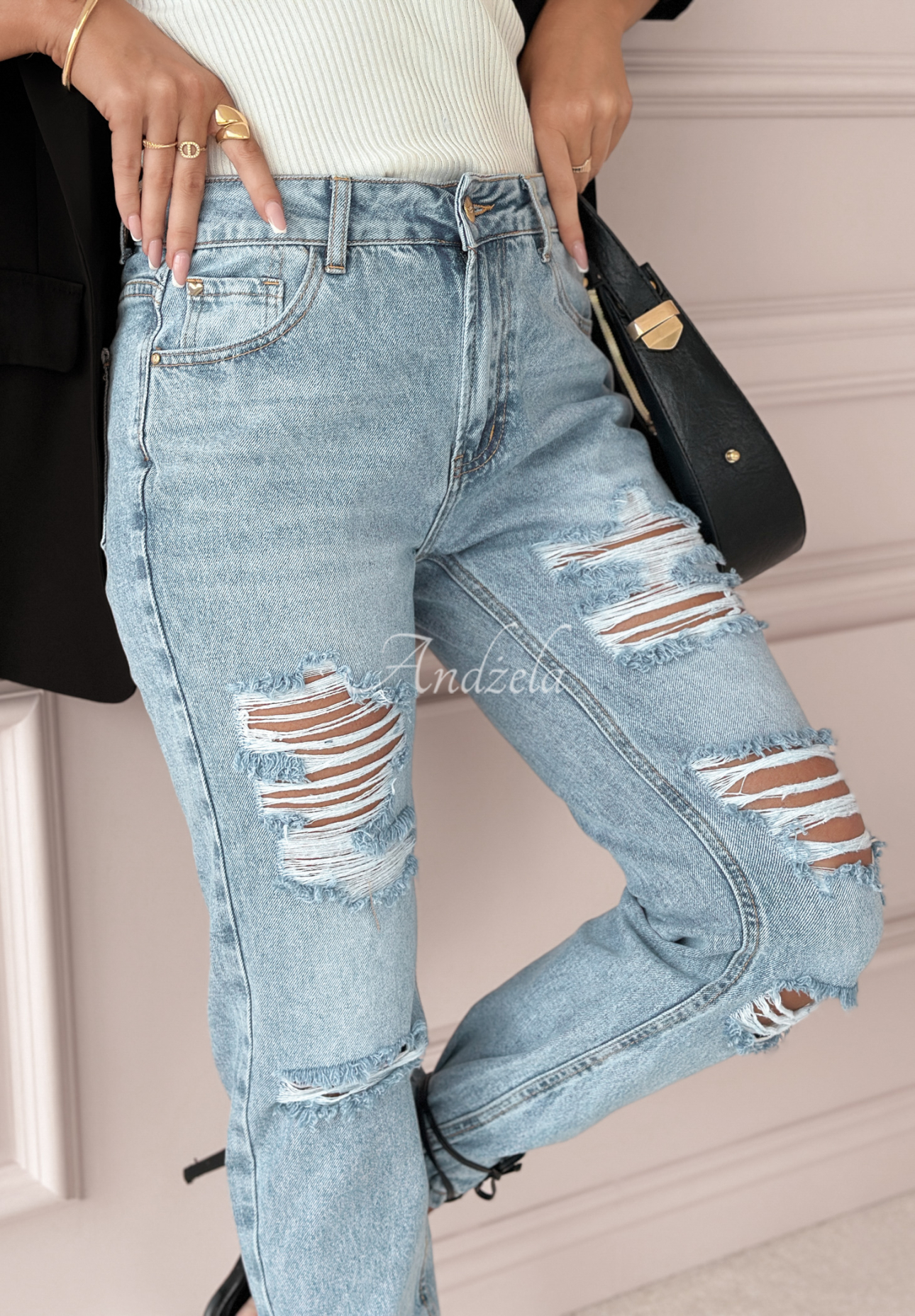 Greatest Joy light blue denim pants with rubbed edges