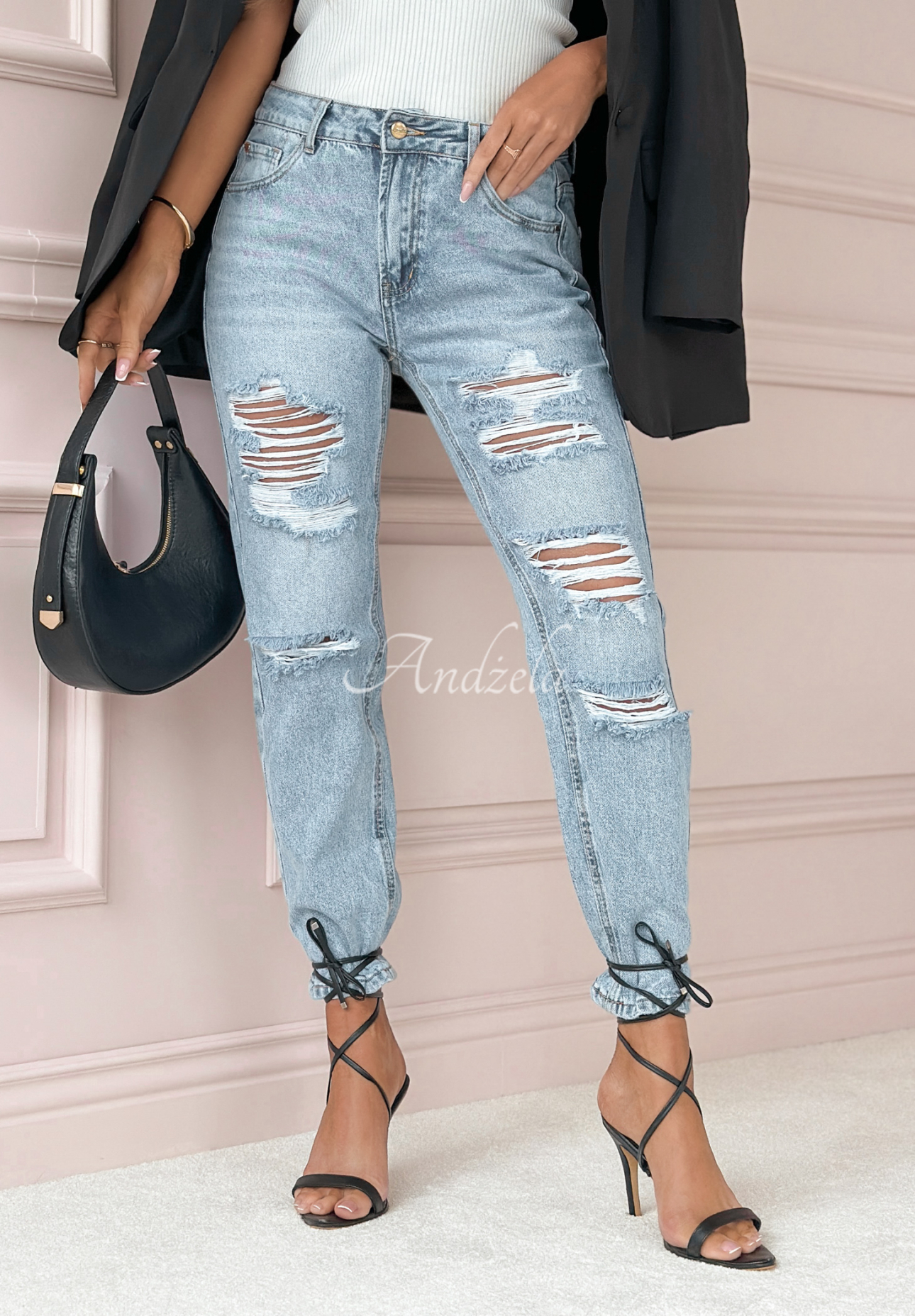 Greatest Joy light blue denim pants with rubbed edges