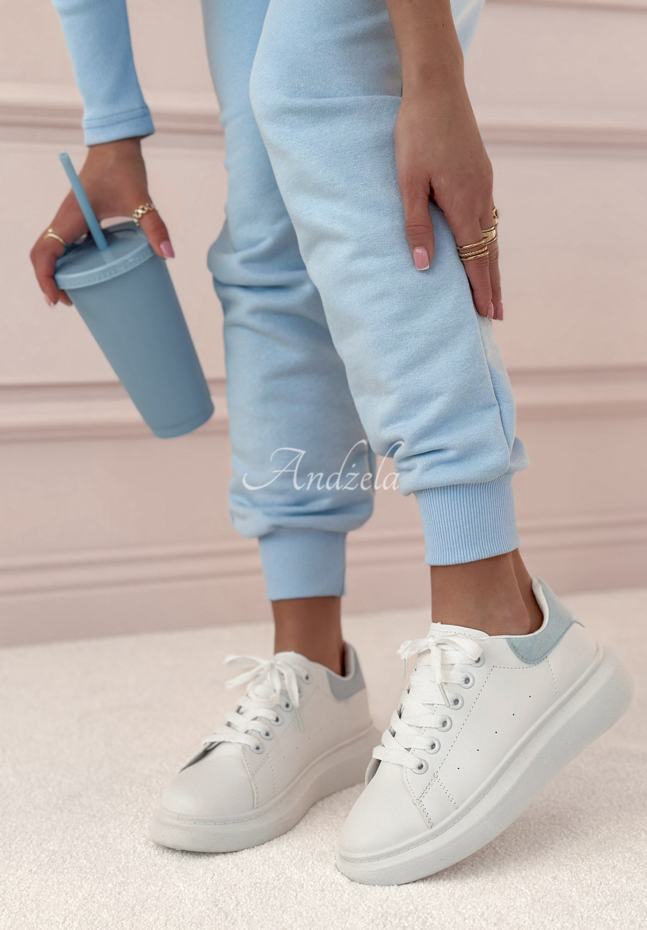 Get A Little Lost white and blue sneakers