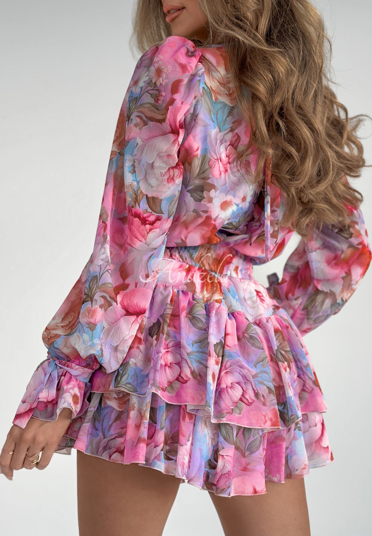 Floral Innovators pink and blue floral ruffle jumpsuit
