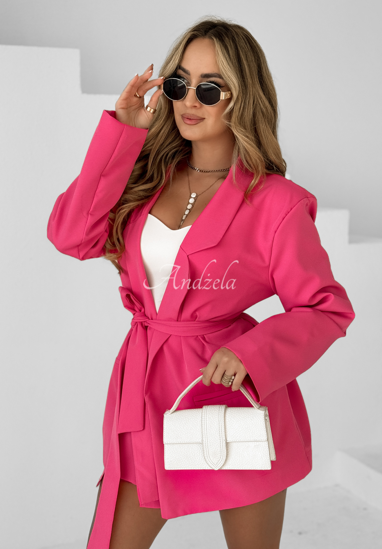 The Class fuchsia jacket and skirt-shorts set