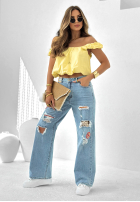 Spodnie jeansowe z przetarciami i naszywkami Cute & Trendy niebieskie