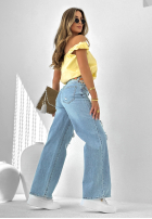 Spodnie jeansowe z przetarciami i naszywkami Cute & Trendy niebieskie