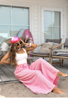 Materiałowe spodnie wide leg z wiązaniem Wavy Happiness różowe