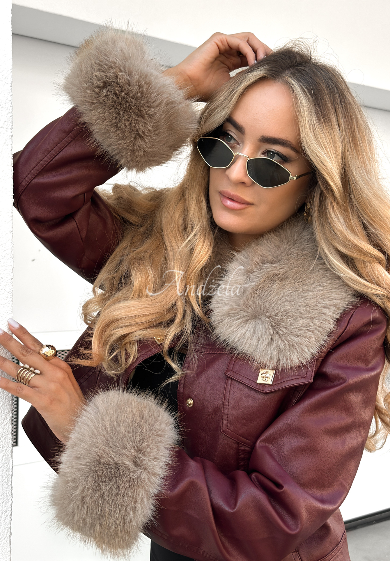 Dare To Do burgundy leather jacket with fur.