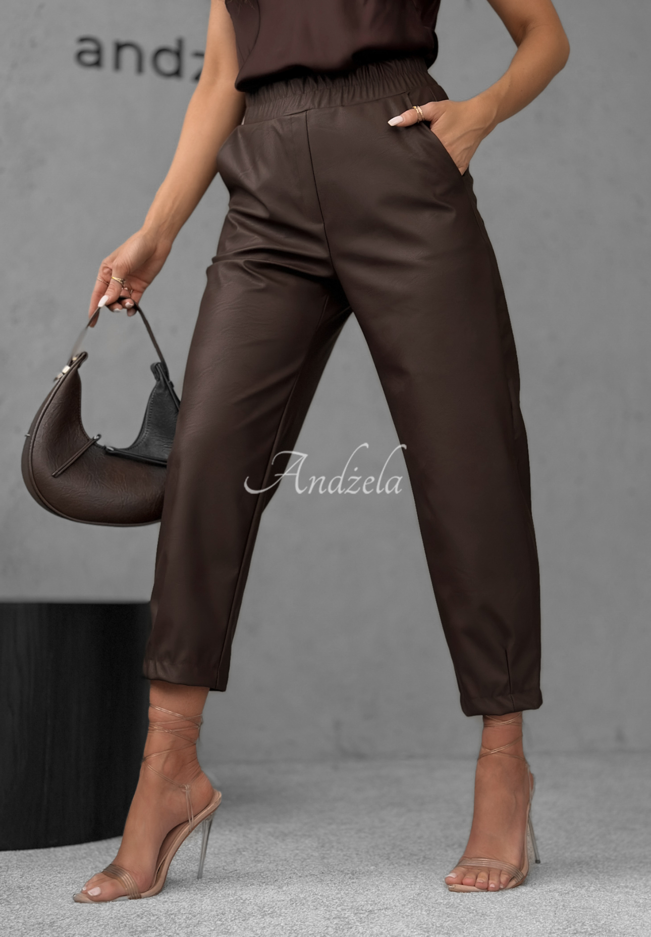 She Is Strong waxed chocolate pants