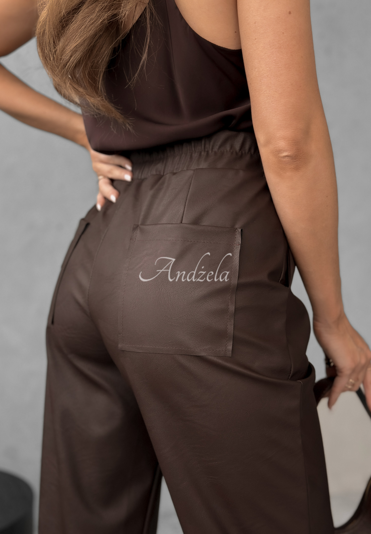 She Is Strong waxed chocolate pants