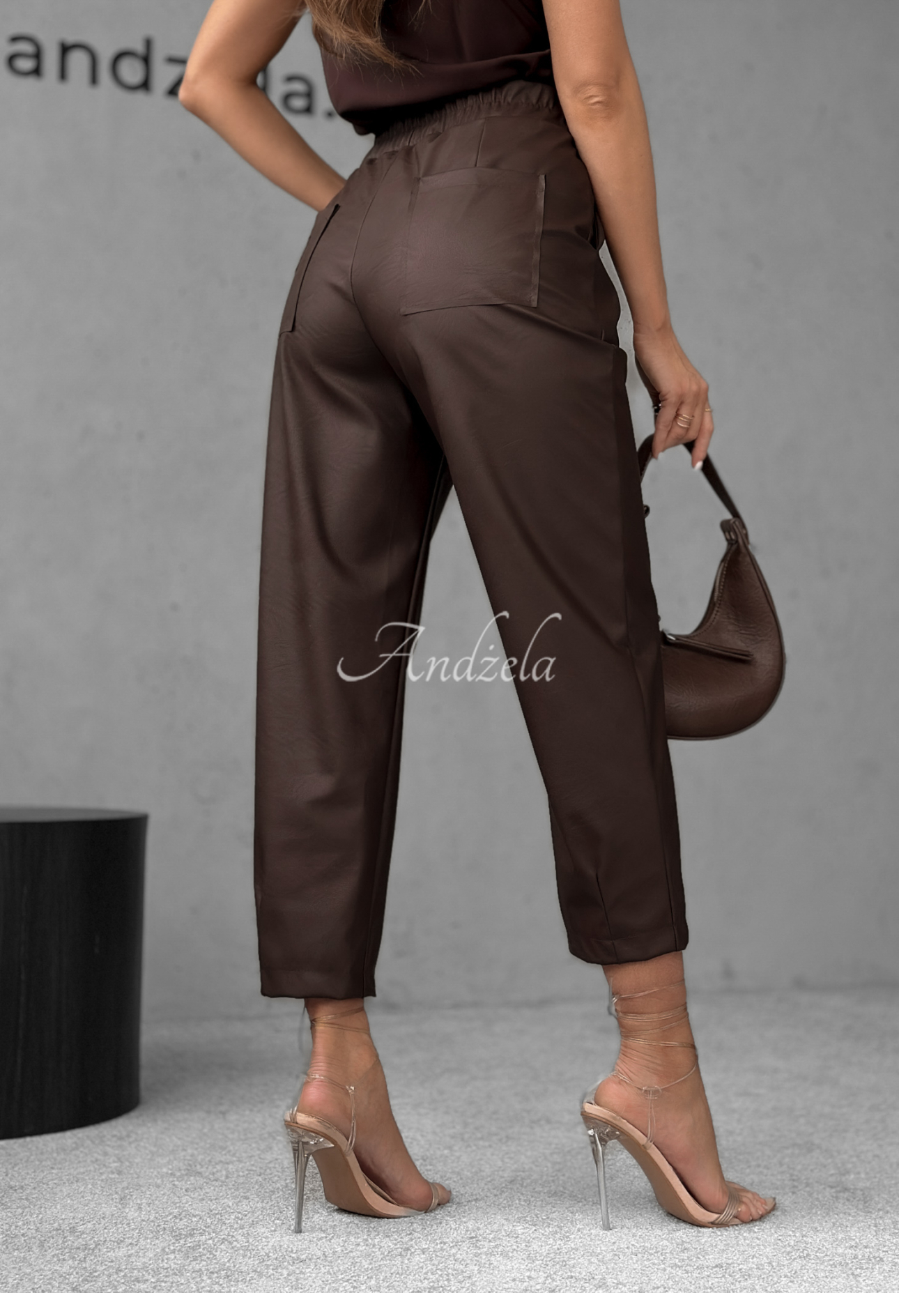 She Is Strong waxed chocolate pants