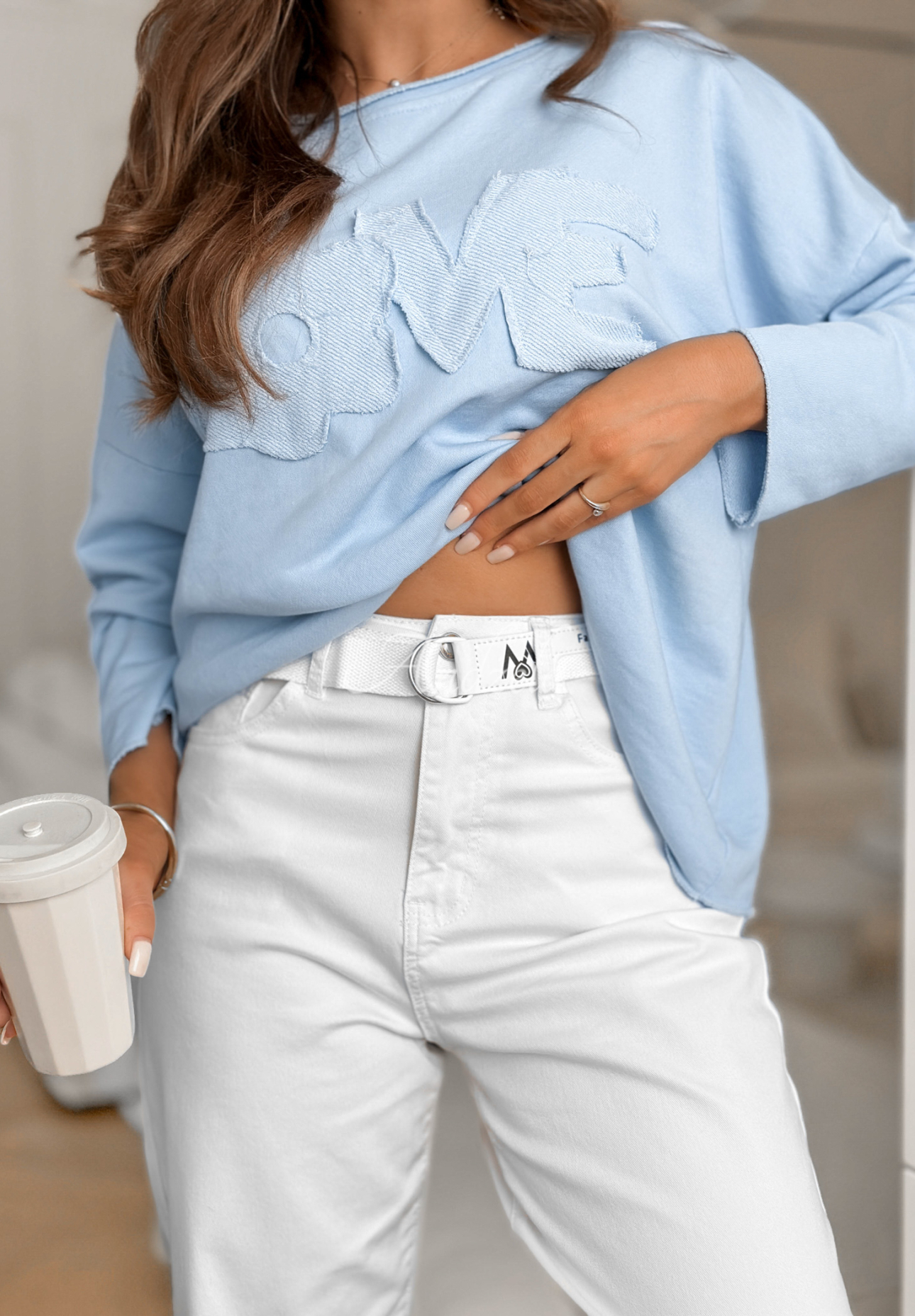 Mom fit jeans with Know Nothing belt, white