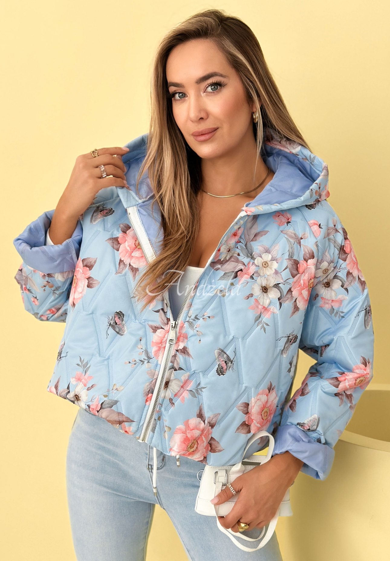 Short quilted jacket with hood in blue Begonia flowers
