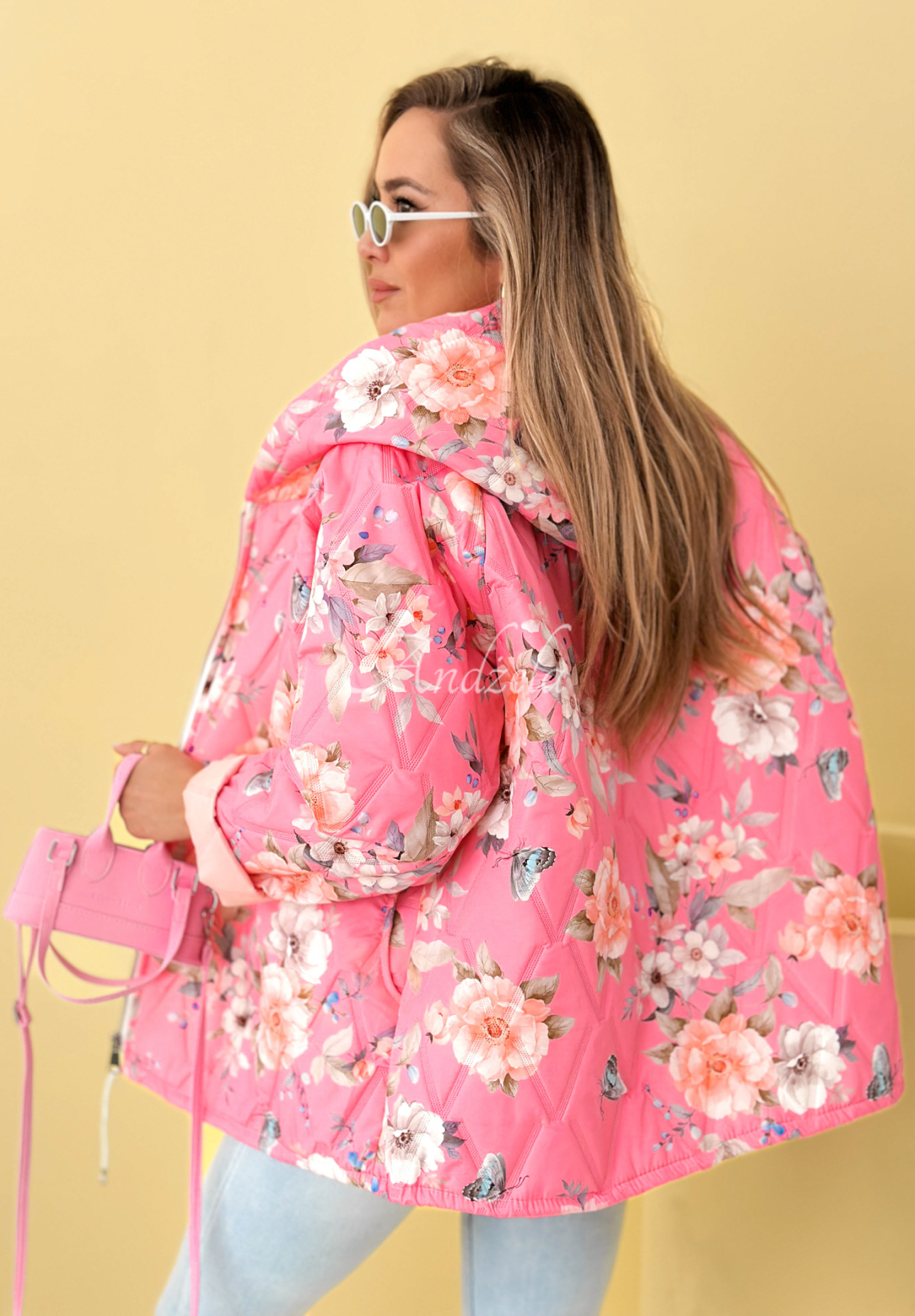 Short quilted jacket with hood in pink Begonia floral print