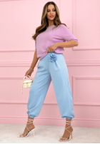 Eleganckie spodnie dresowe masełko z różą Blossom Symphony ecru