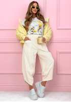 Materiałowe spodnie z kieszeniami i ściągaczami Only Sunny Days żółte