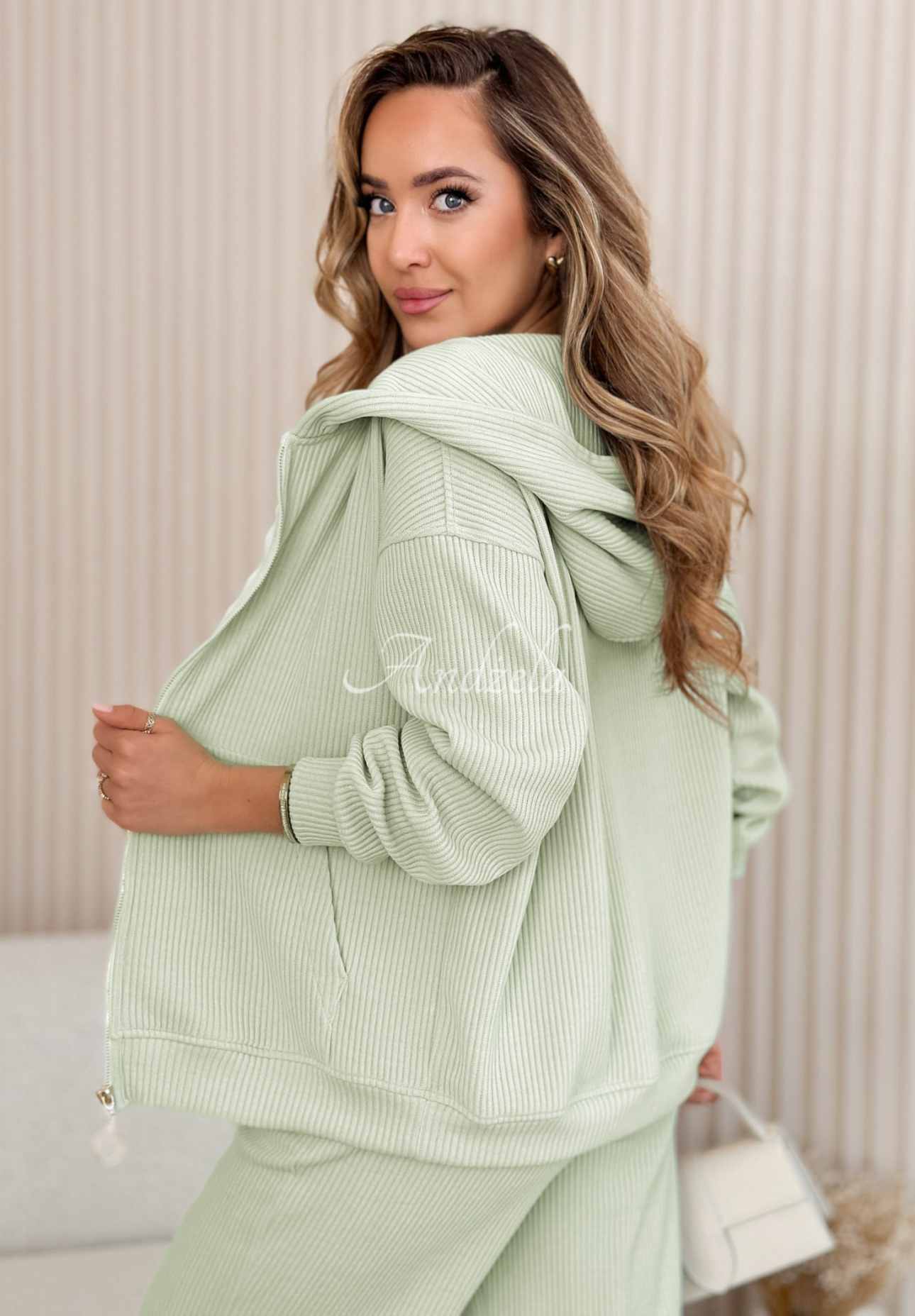 Pistachio-colored striped cotton sweatshirt and pants set by Marcella