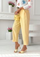 Materiałowe spodnie z paskiem i gumką w pasie Liora różowe