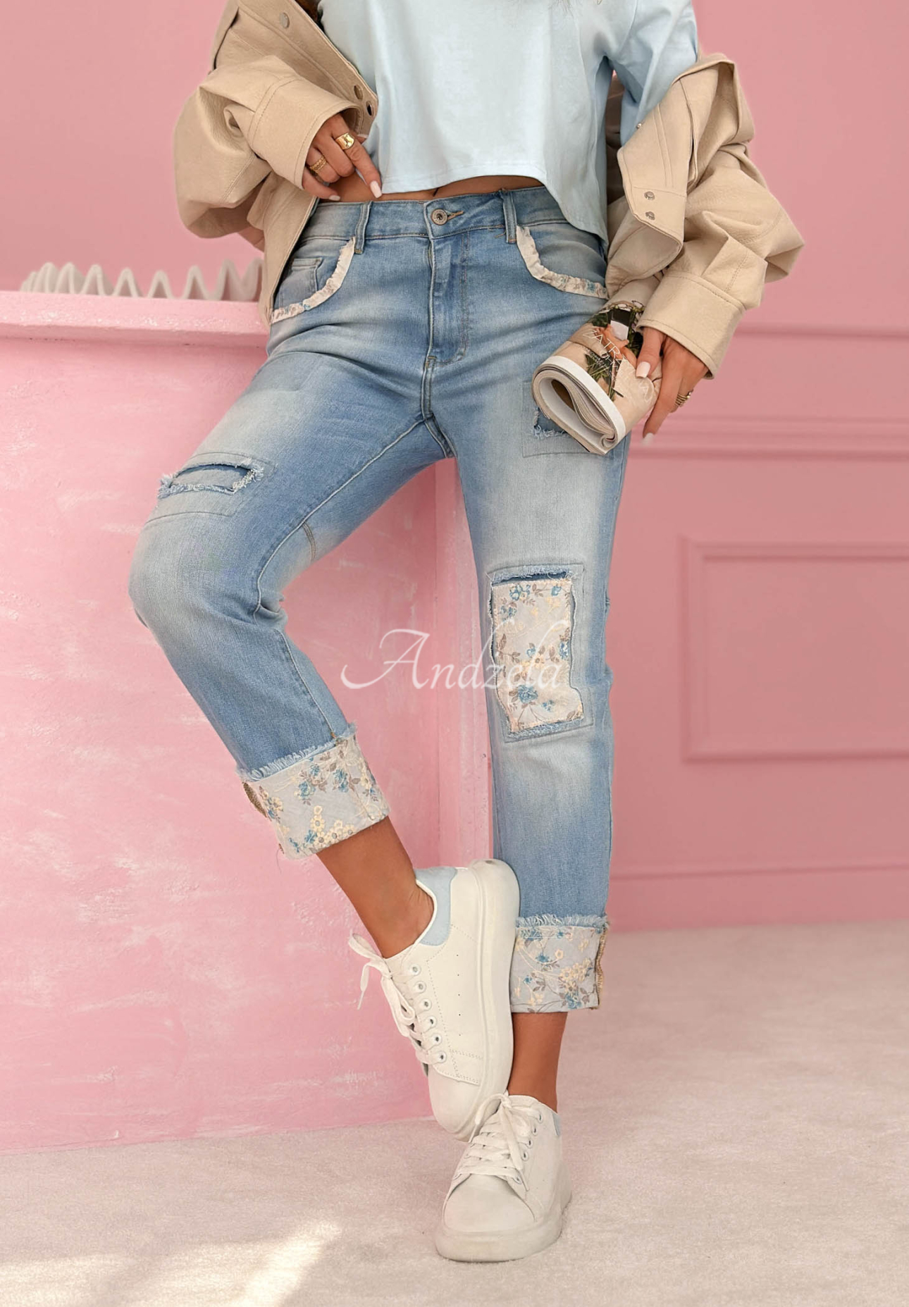 Light blue mom-fit jeans with "Come Back Again" patches