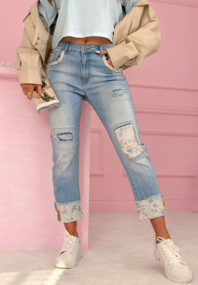 Light blue mom-fit jeans with "Come Back Again" patches