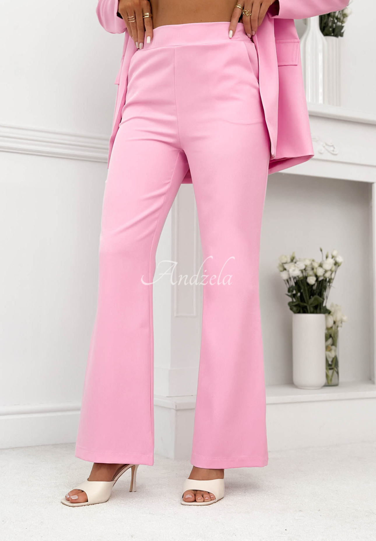Women's suit with belt by Old News in powder pink
