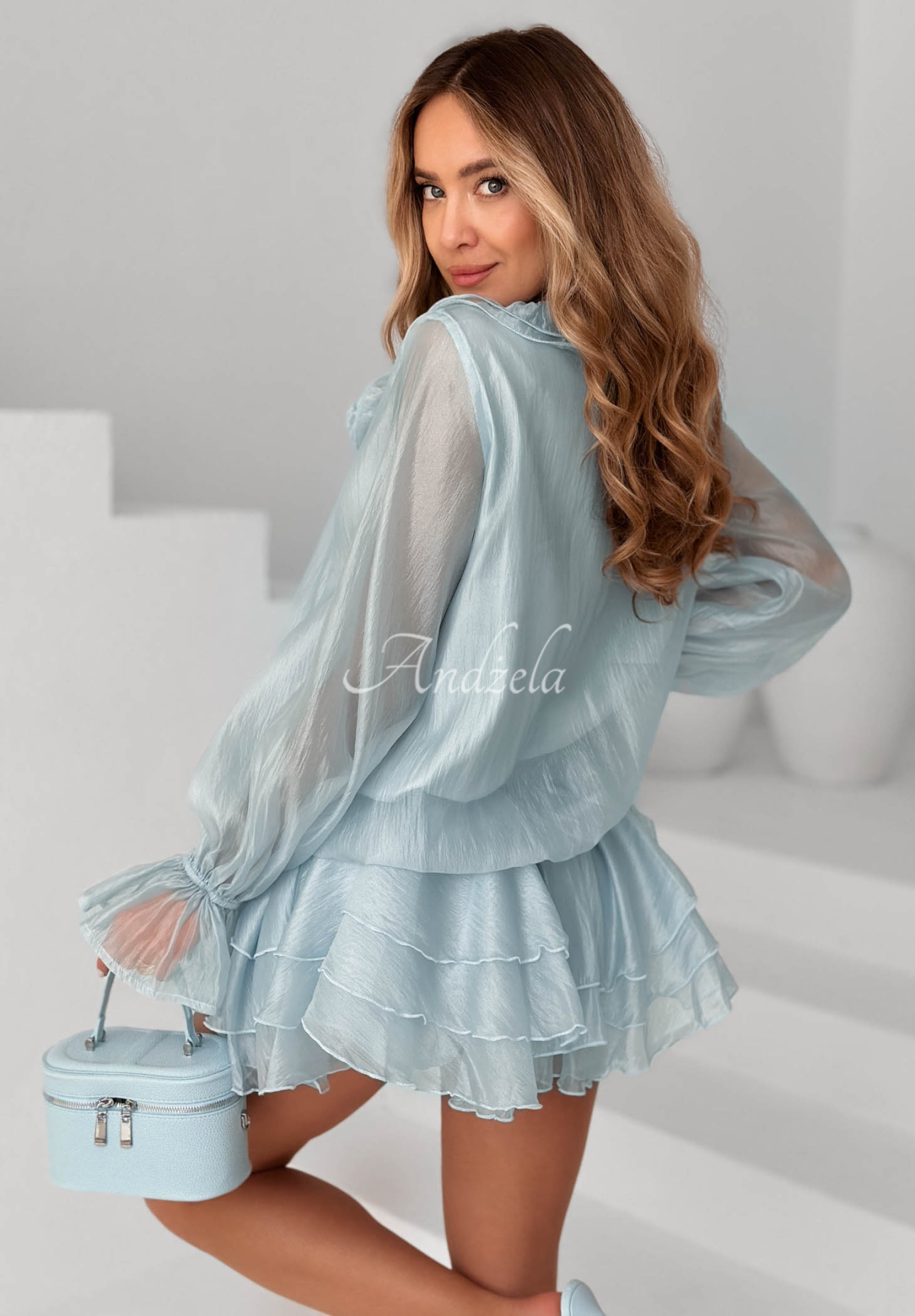 Short chiffon jumpsuit with ruffles and roses by If Only You, sky blue