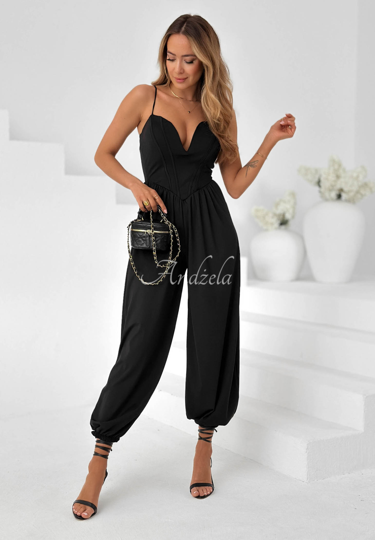 You Got Me Black Strapless Corset Jumpsuit