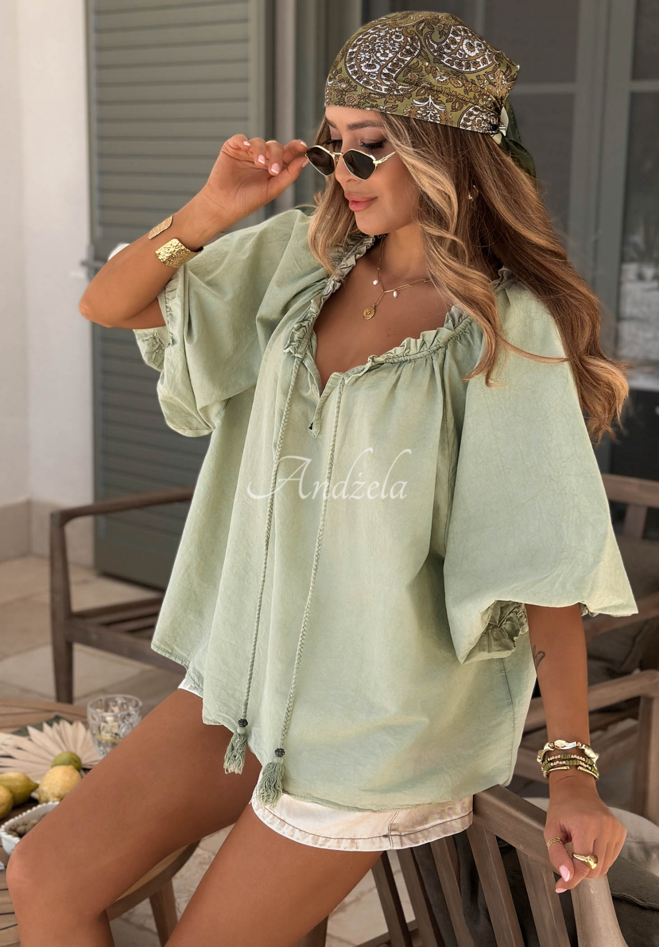 Bellanova pistachio-colored cotton blouse with puff sleeves and a tie at the neckline