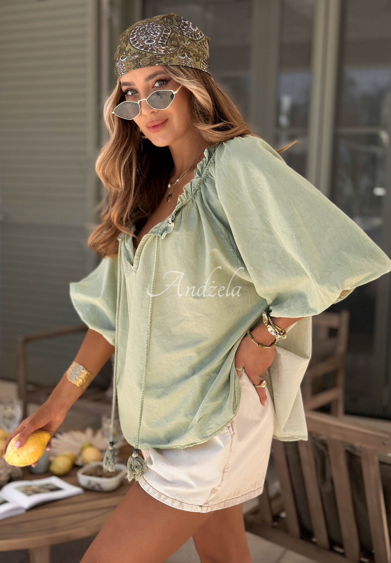 Bellanova pistachio-colored cotton blouse with puff sleeves and a tie at the neckline