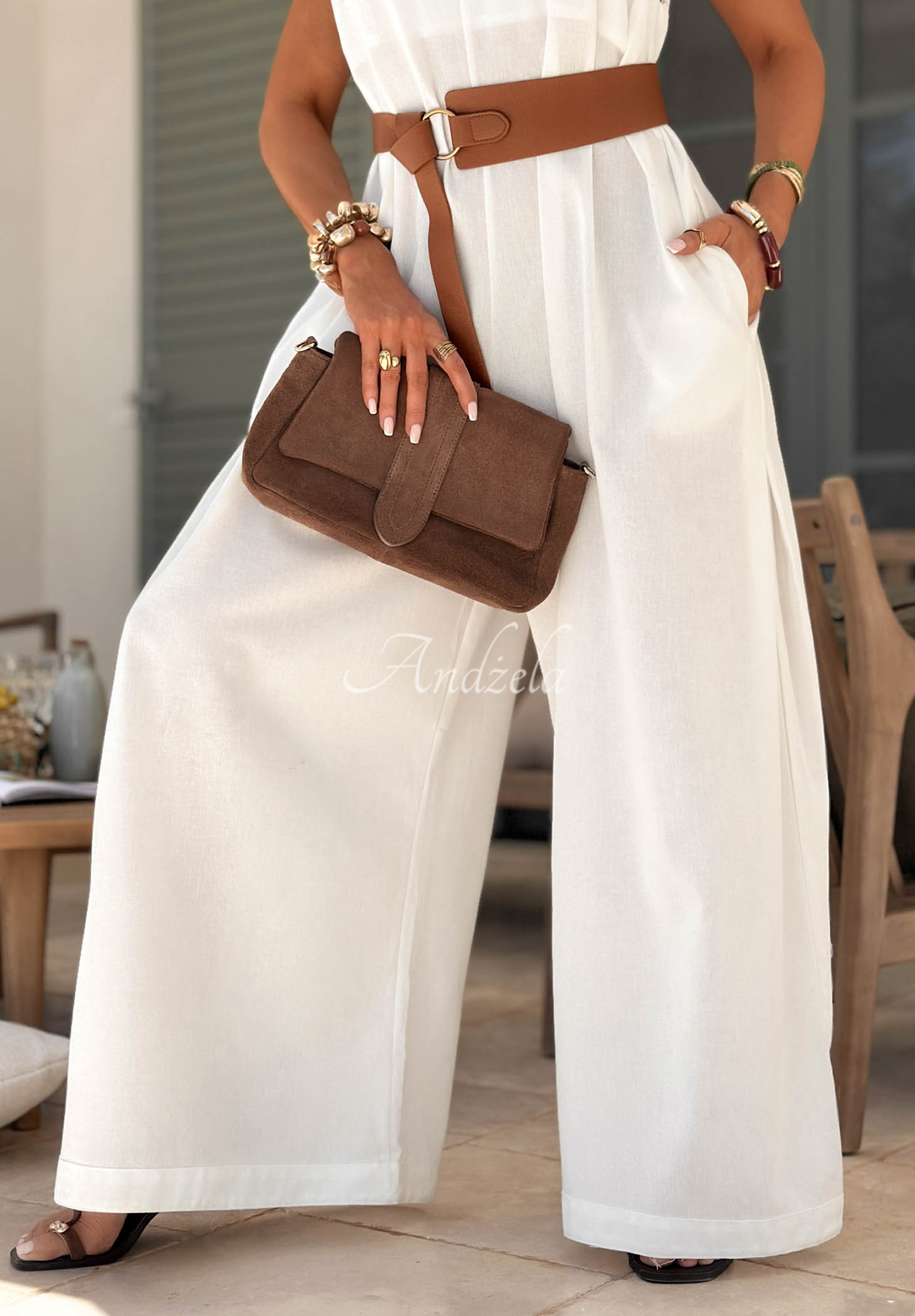 Long linen jumpsuit with wide legs and a belt by Tanala in ecru