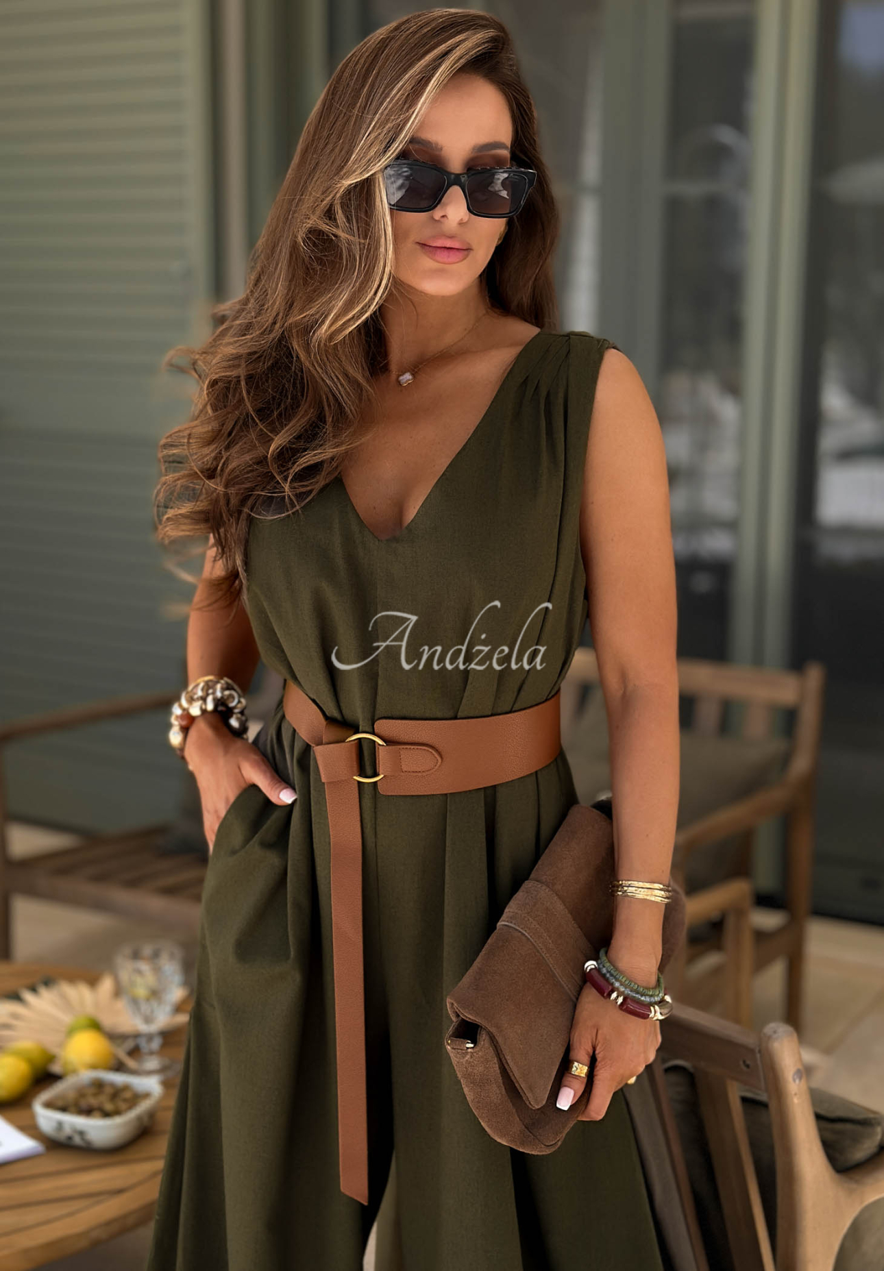 Long linen jumpsuit with wide legs and a belt by Tanala in khaki