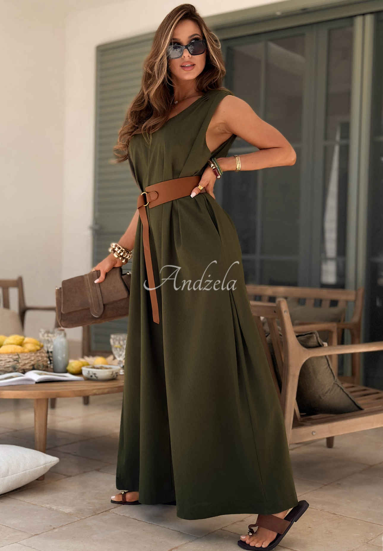 Long linen jumpsuit with wide legs and a belt by Tanala in khaki