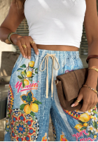 Materiałowe spodnie wide leg we wzory You're My Favourite niebieskie