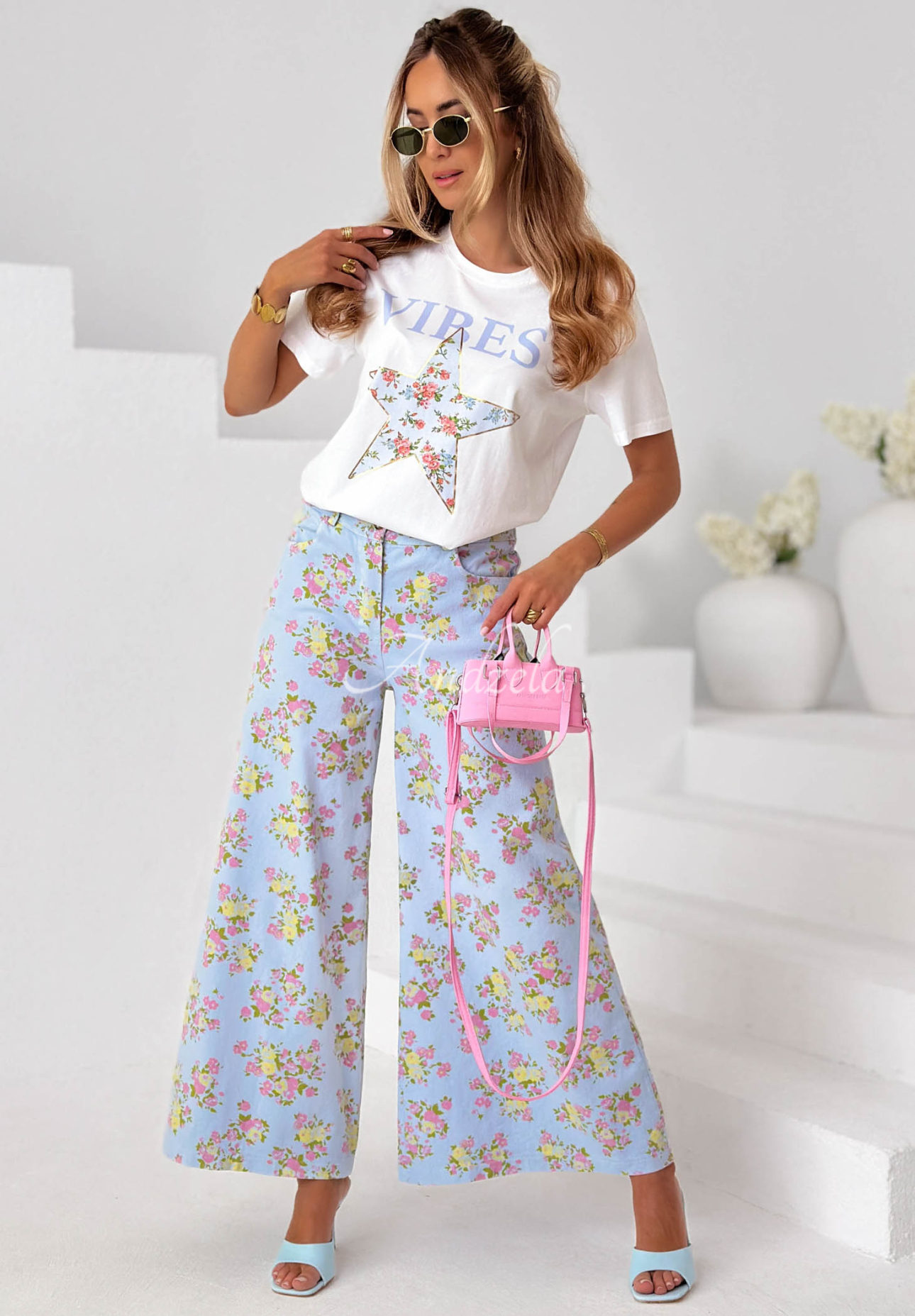 Flower Vibes wide-leg denim pants with a floral print in sky blue