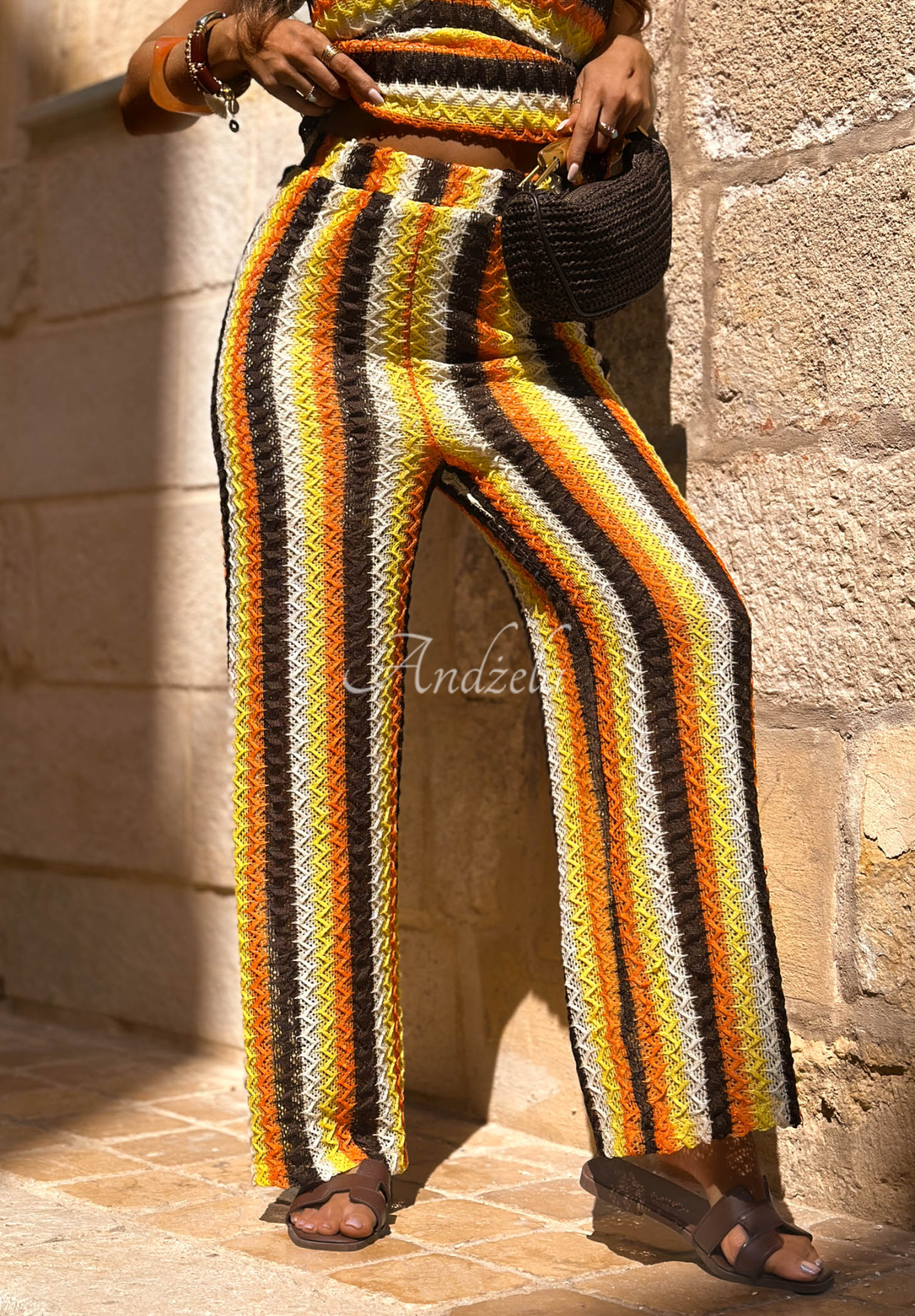 Oh Mamma Mia orange-and-chocolate-colored openwork pants with colorful stripes