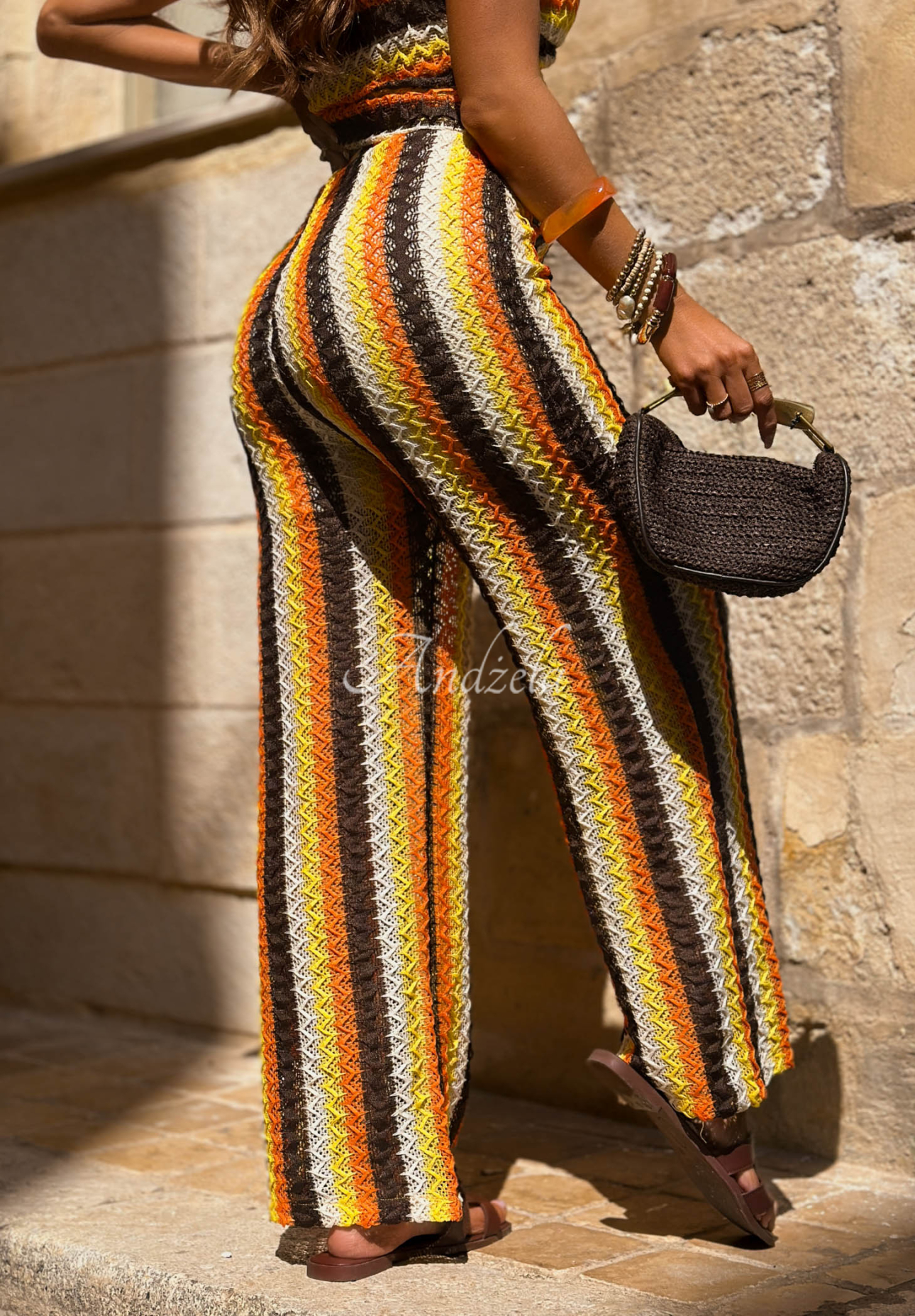 Oh Mamma Mia orange-and-chocolate-colored openwork pants with colorful stripes