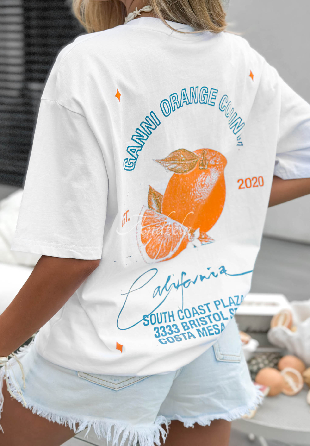 White cotton T-shirt with "Costa Mesa" print