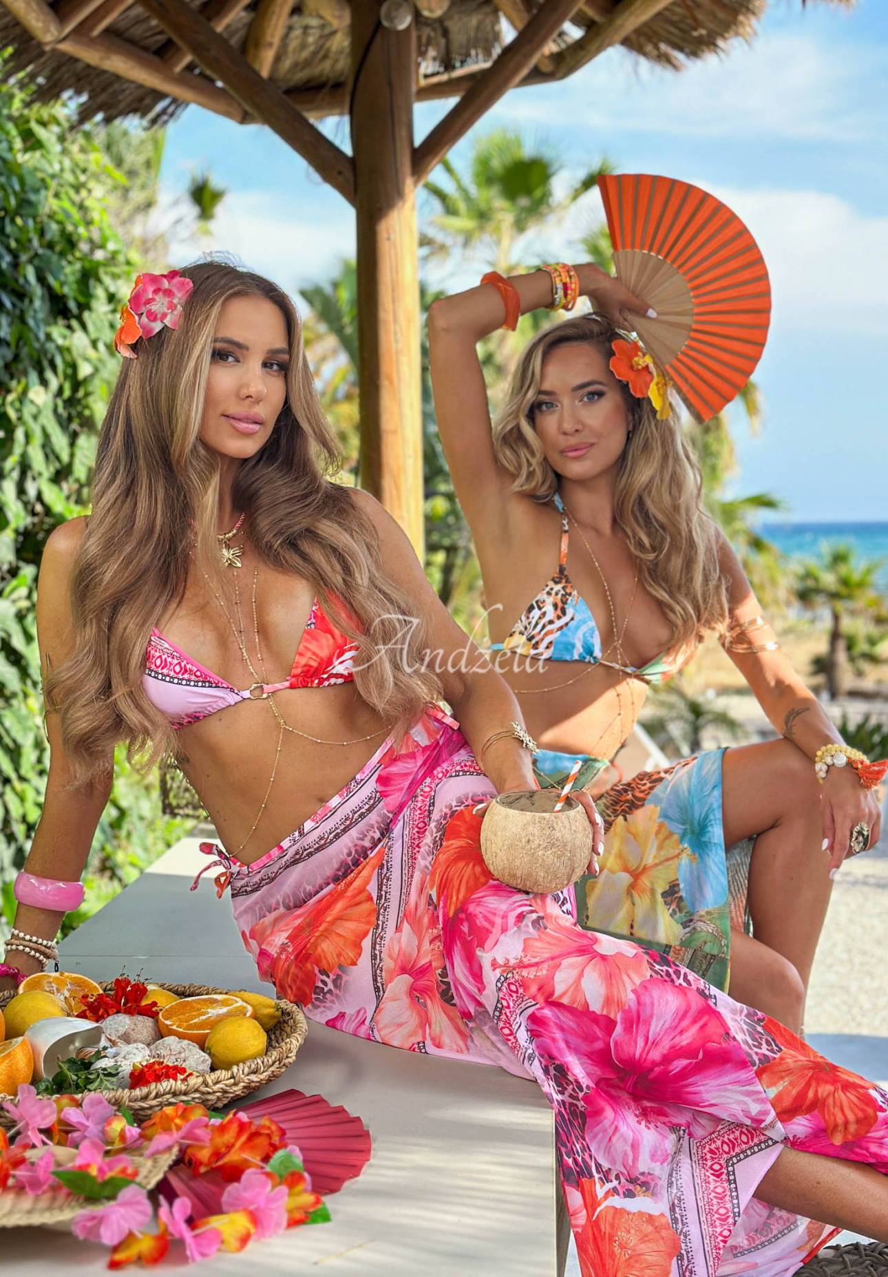 Two-piece swimsuit and pareo set in the Mermaid Kiss orange and turquoise pattern