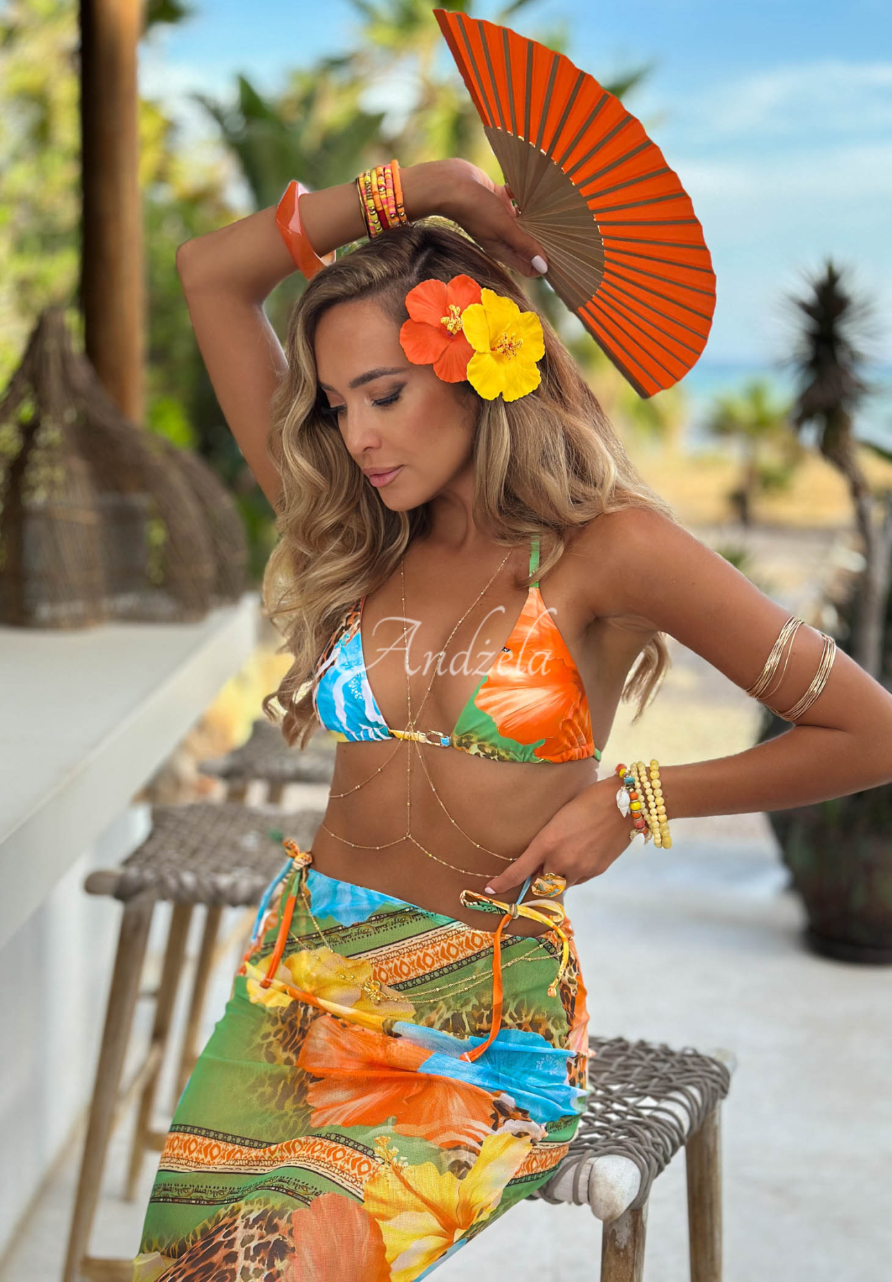 Two-piece swimsuit and pareo set in the Mermaid Kiss orange and turquoise pattern