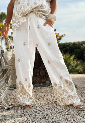White wide-leg fabric pants with a Summer Palms print