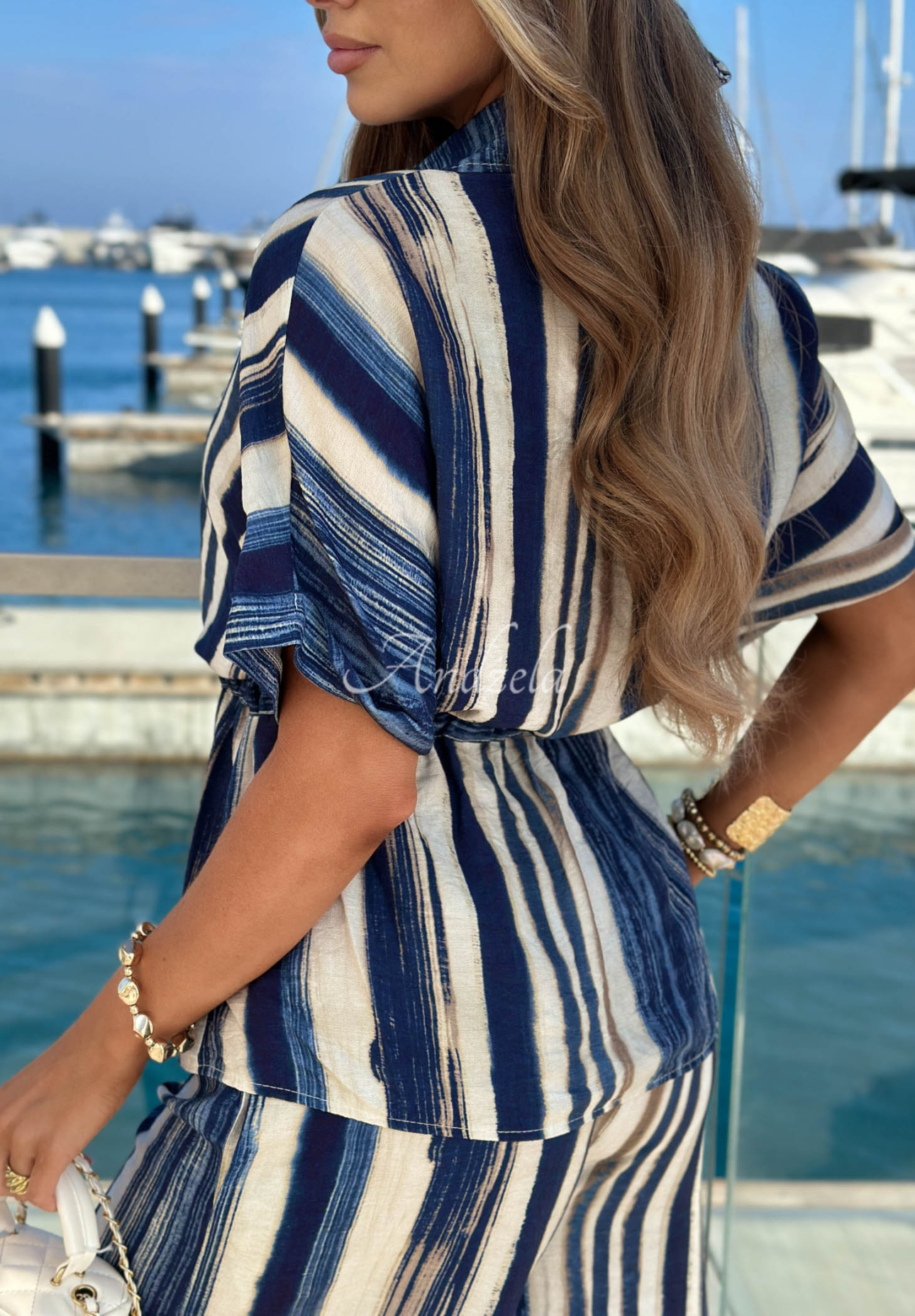 Viscose shirt and wide-leg striped pants set by Trinidad Sun in white and navy blue