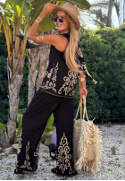 Wzorzysty komplet top i spodnie wide leg Palm Residence granatowy