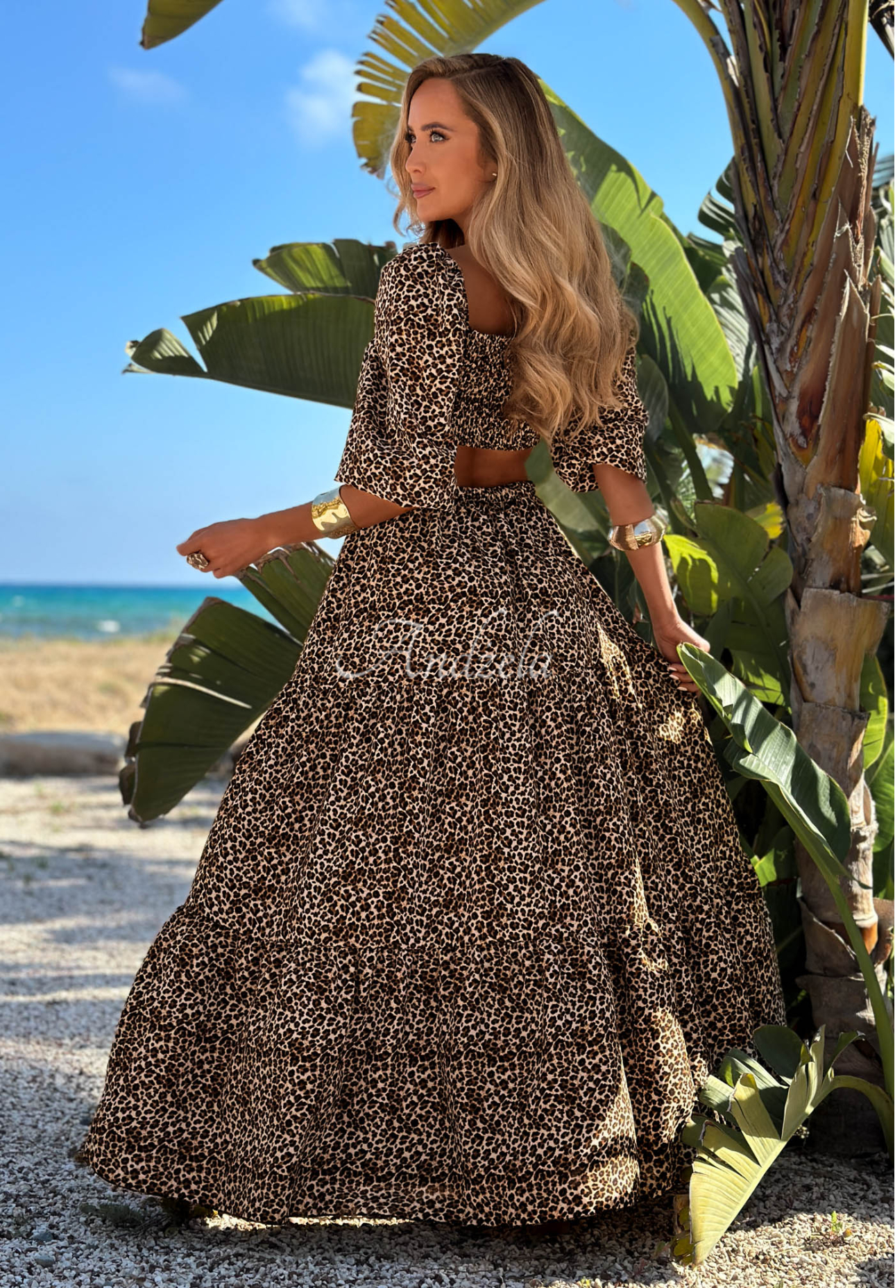 Beige Sand Panther leopard-print viscose set featuring an off-the-shoulder blouse and skirt