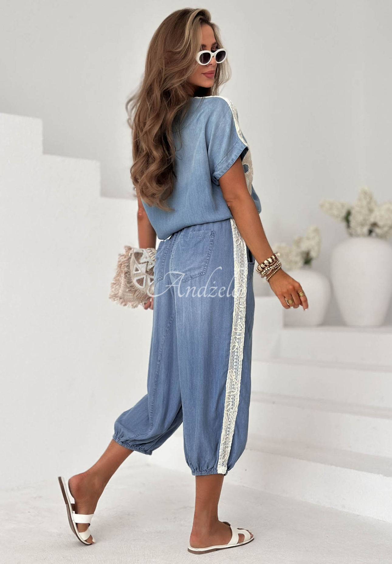 Blue lyocell jogger pants with a Sunset Palm patch