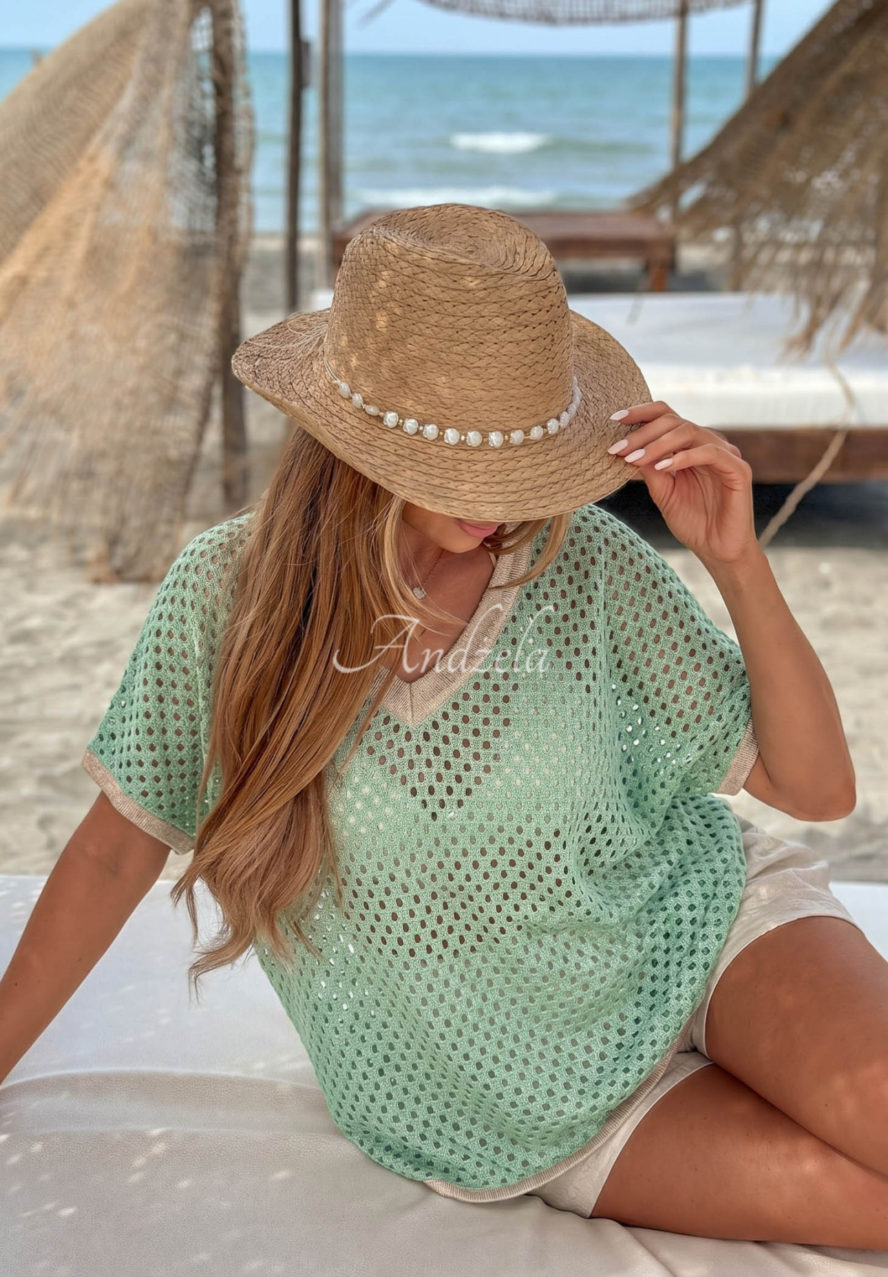 Ażurowy bawełniany sweter z dekoltem Sandy Glow pistacjowy