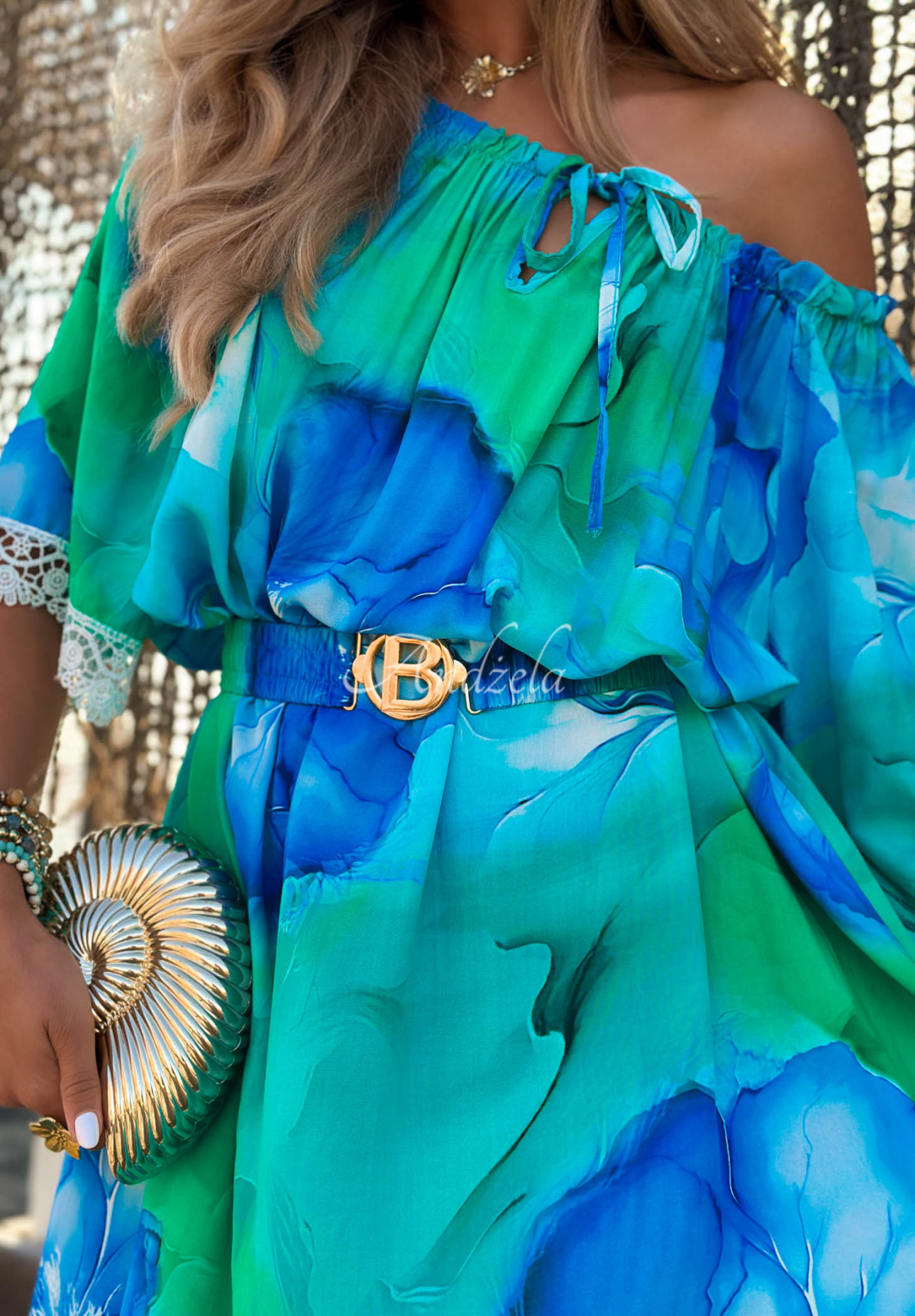 Asymmetrical off-the-shoulder patterned dress made of Aqua Mirage turquoise viscose