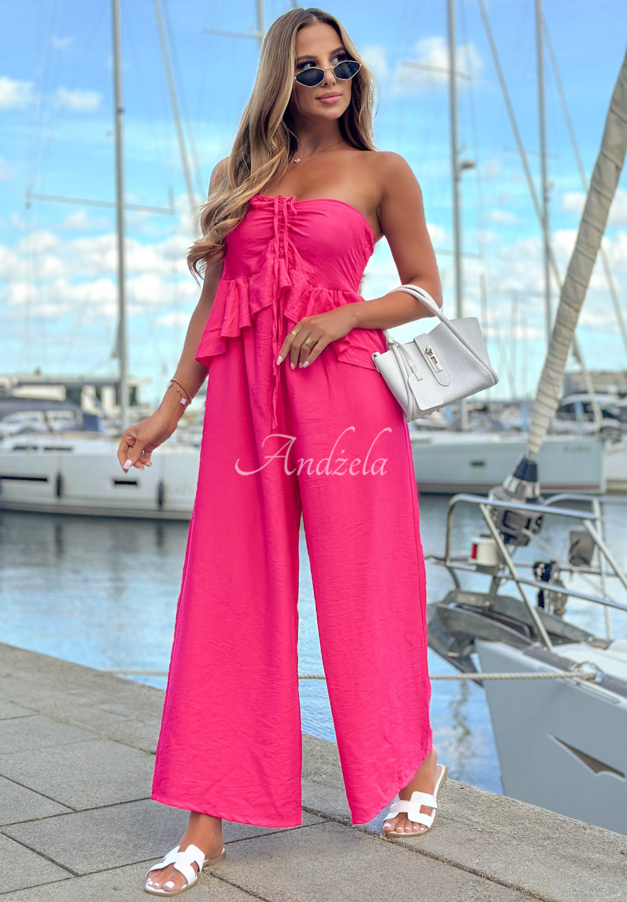 Long viscose jumpsuit with tie-front and ruffle by By The Sea in fuchsia