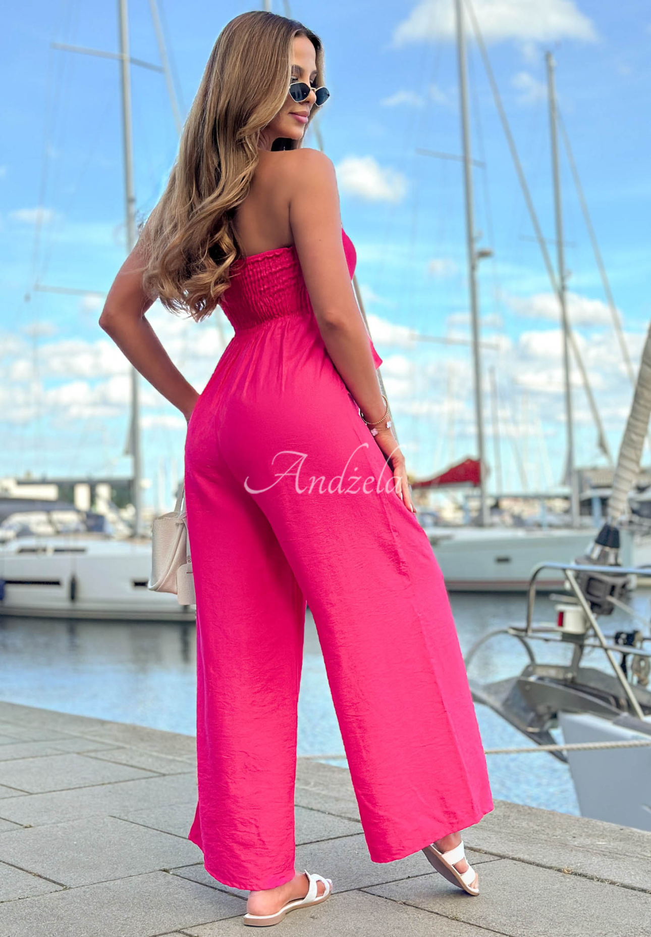 Long viscose jumpsuit with tie-front and ruffle by By The Sea in fuchsia